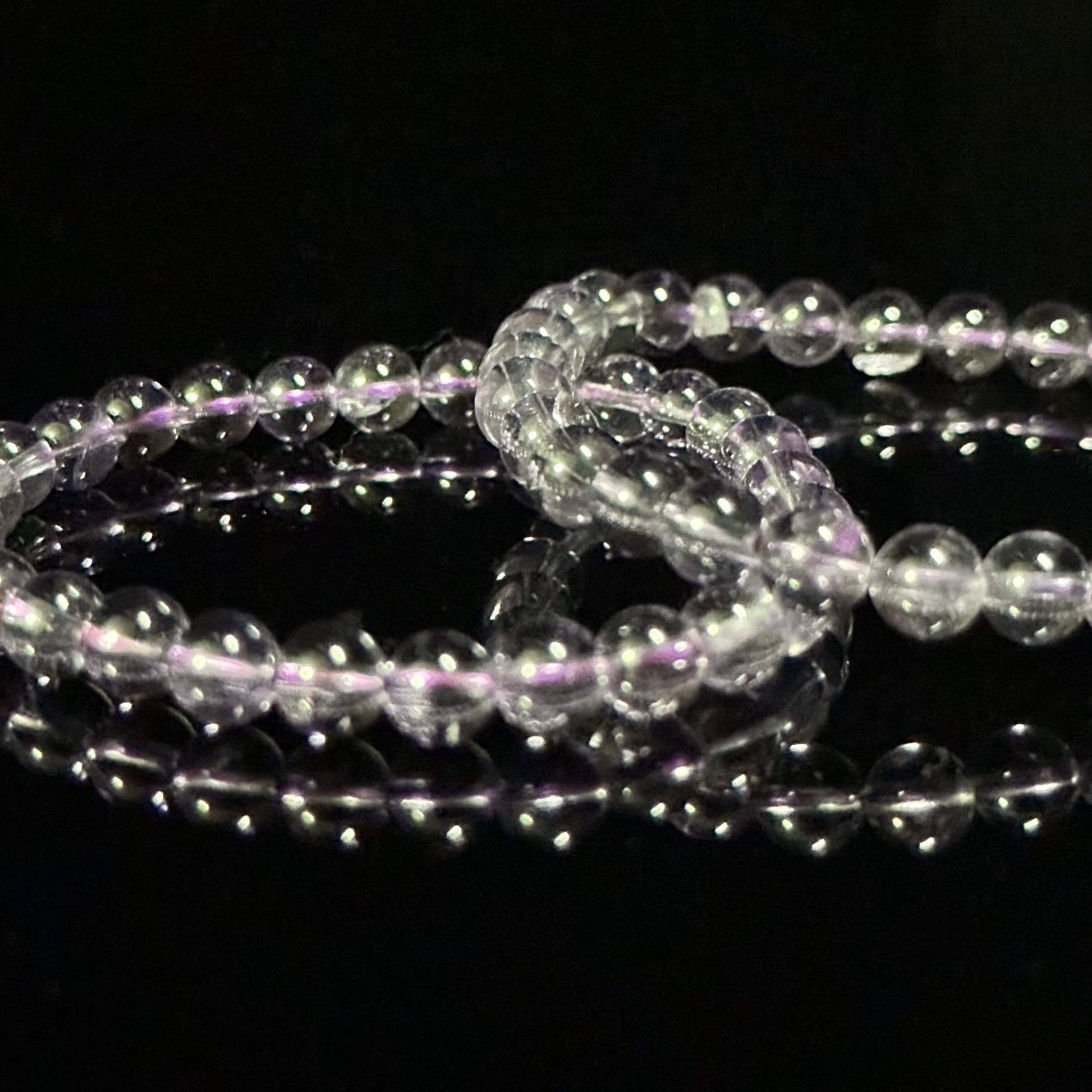 Astralee Jewelry 7mm amethyst bracelet beneits on right hand