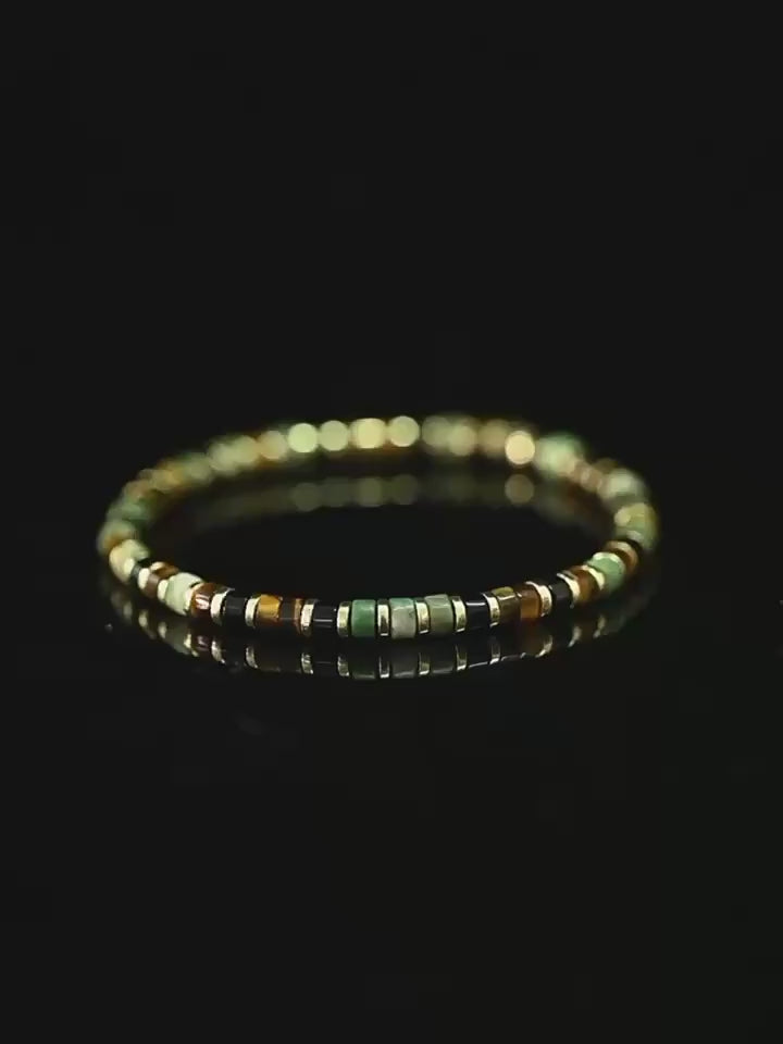 video of Astralee Jewelry 6mm multi color jasper bracelet